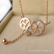 Promotional item artificial gold long chain imitation necklace personalized letter h and wheel crystal necklace